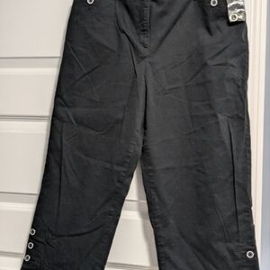 Woman's black capris with Button Details. New with tags